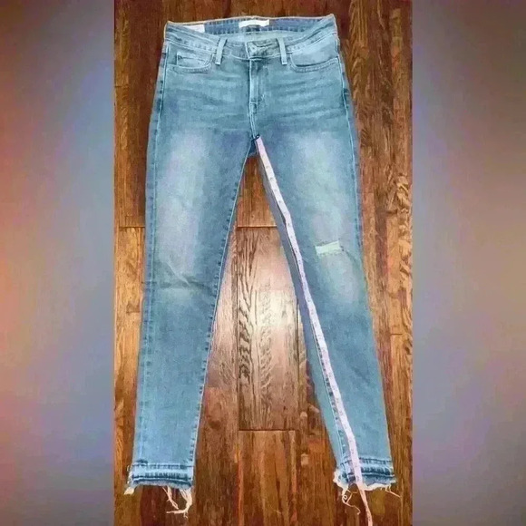 LEVIS Premium 711 Mid Rise Skinny Jean with Raw Hem in Light Wash - Picture 3 of 13